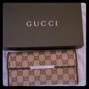 Authentic Gucci long Monogram brown canvas wallet